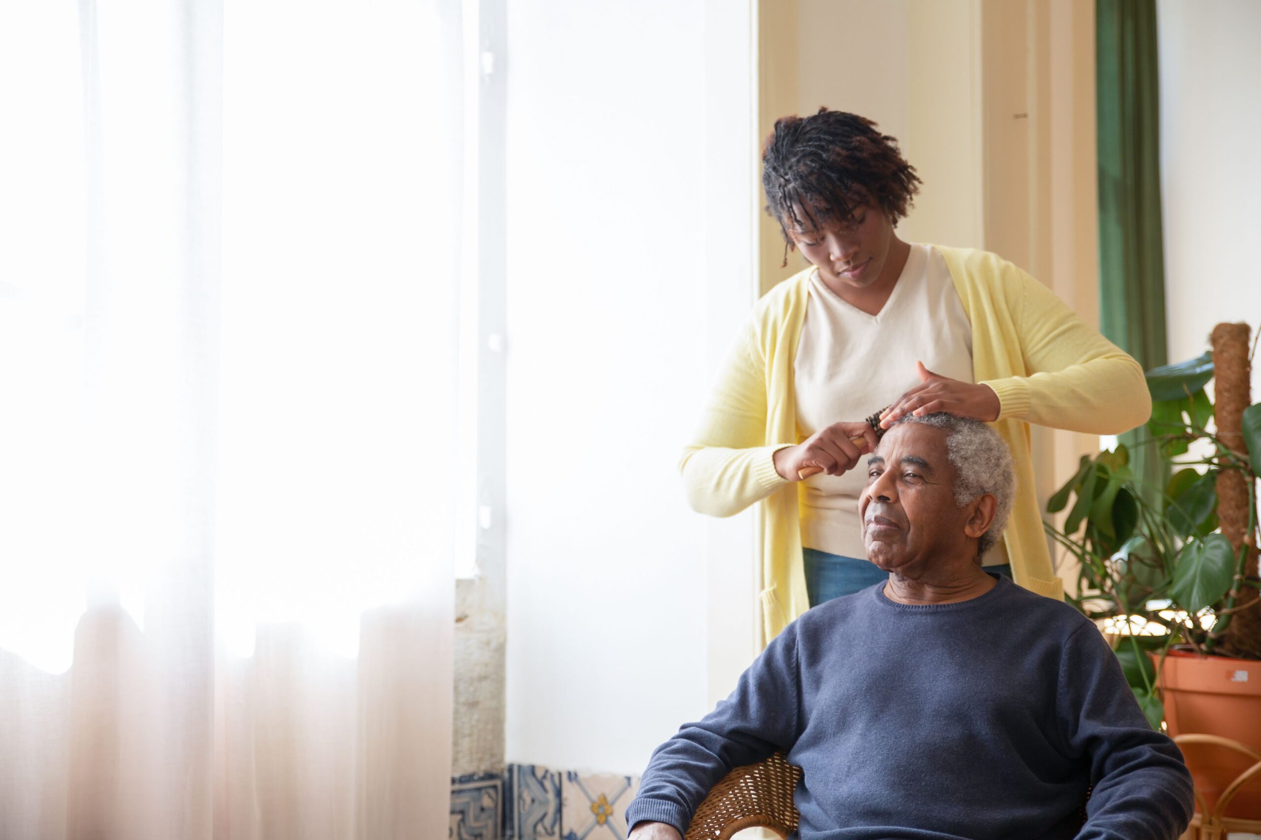 In-home Alzheimer's care in Hoover, AL — a caregiver supporting an older adult at home